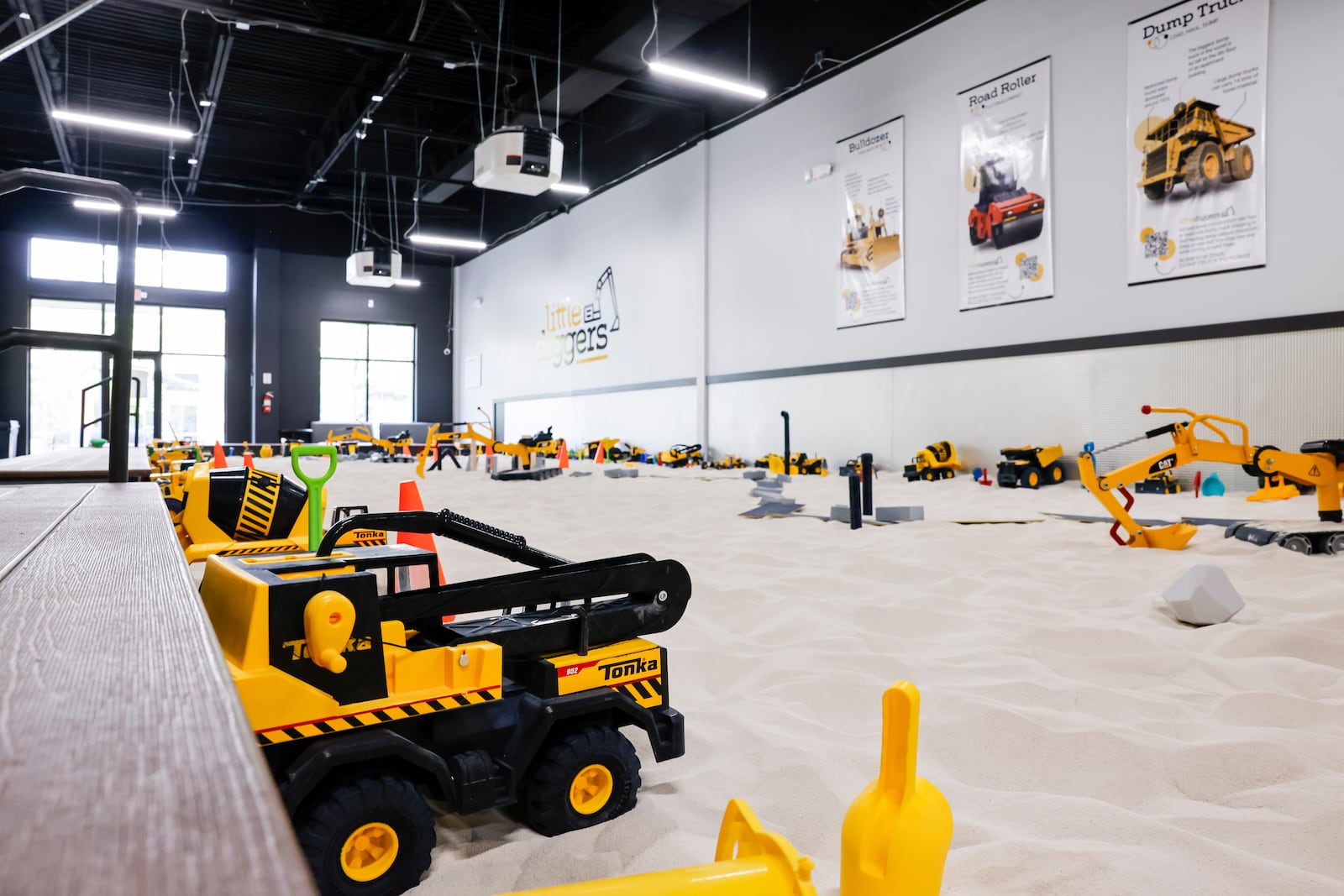 Little Diggers is a newer play place for kids 7 and younger at 9442 Waterfront Drive in West Chester Township. There are toy excavators, dumps trucks and more to play with in the giant indoor sand box and two smaller sandboxes that can be used for private party events. NICK GRAHAM/STAFF