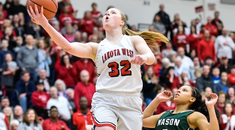 Lakota West's Abby Prohaska puts up a shot during the Division I regional final against Mason on March 10 at Fairmont's Trent Arena. NICK GRAHAM/STAFF