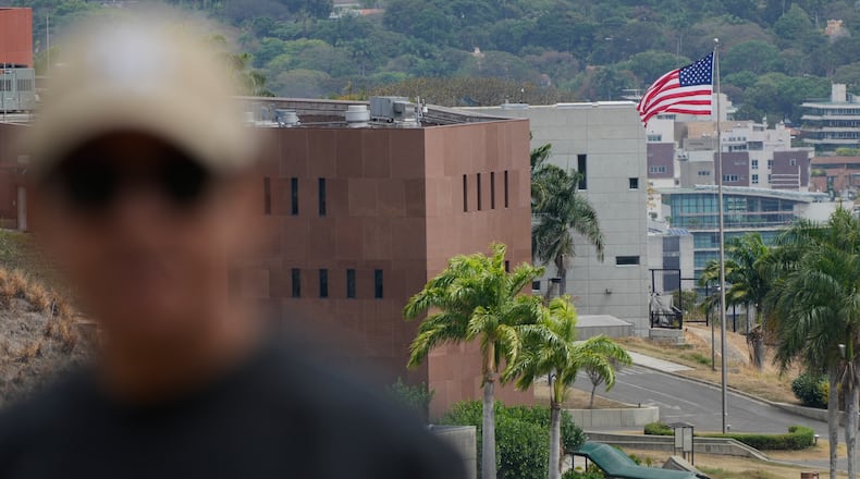 An American flag flies again at the US Embassy in Caracas, Venezuela, Saturday, March 14, 2026, seven years after it was lowered when Washington and Caracas cut diplomatic relations in 2019. (AP Photo/Ariana Cubillos)