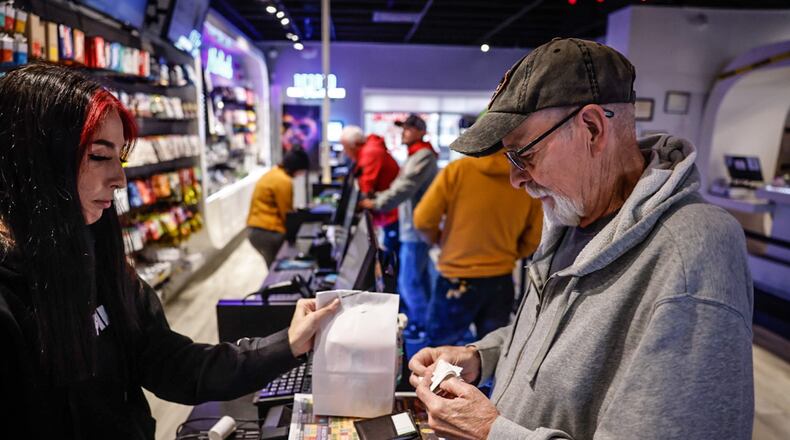 Alex Stephens is from a small town near Toledo, Ohio and crosses the Ohio border into Michigan to buy recreational marijuana at Amazing Budz. JIM NOELKER/STAFF