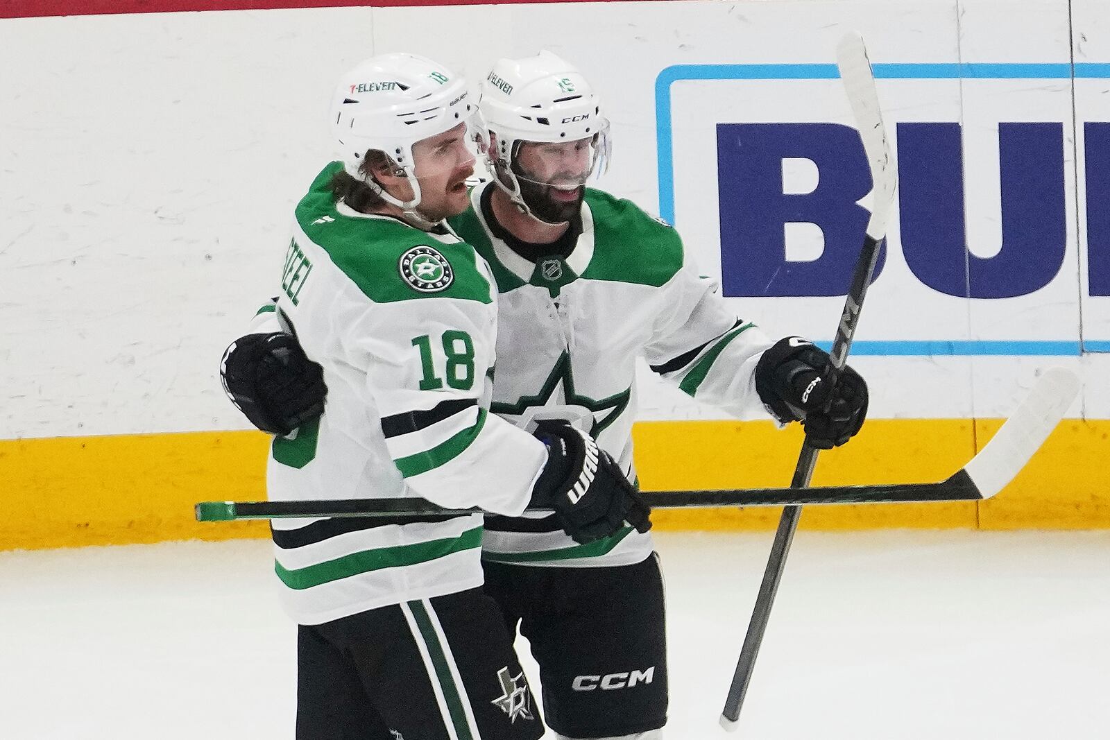 Dallas Stars center Colin Blackwell, right, celebrates his goal with Sam Steel (18) against the Detroit Red Wings in the second period of an NHL hockey game Monday, April 14, 2025, in Detroit. (AP Photo/Paul Sancya)