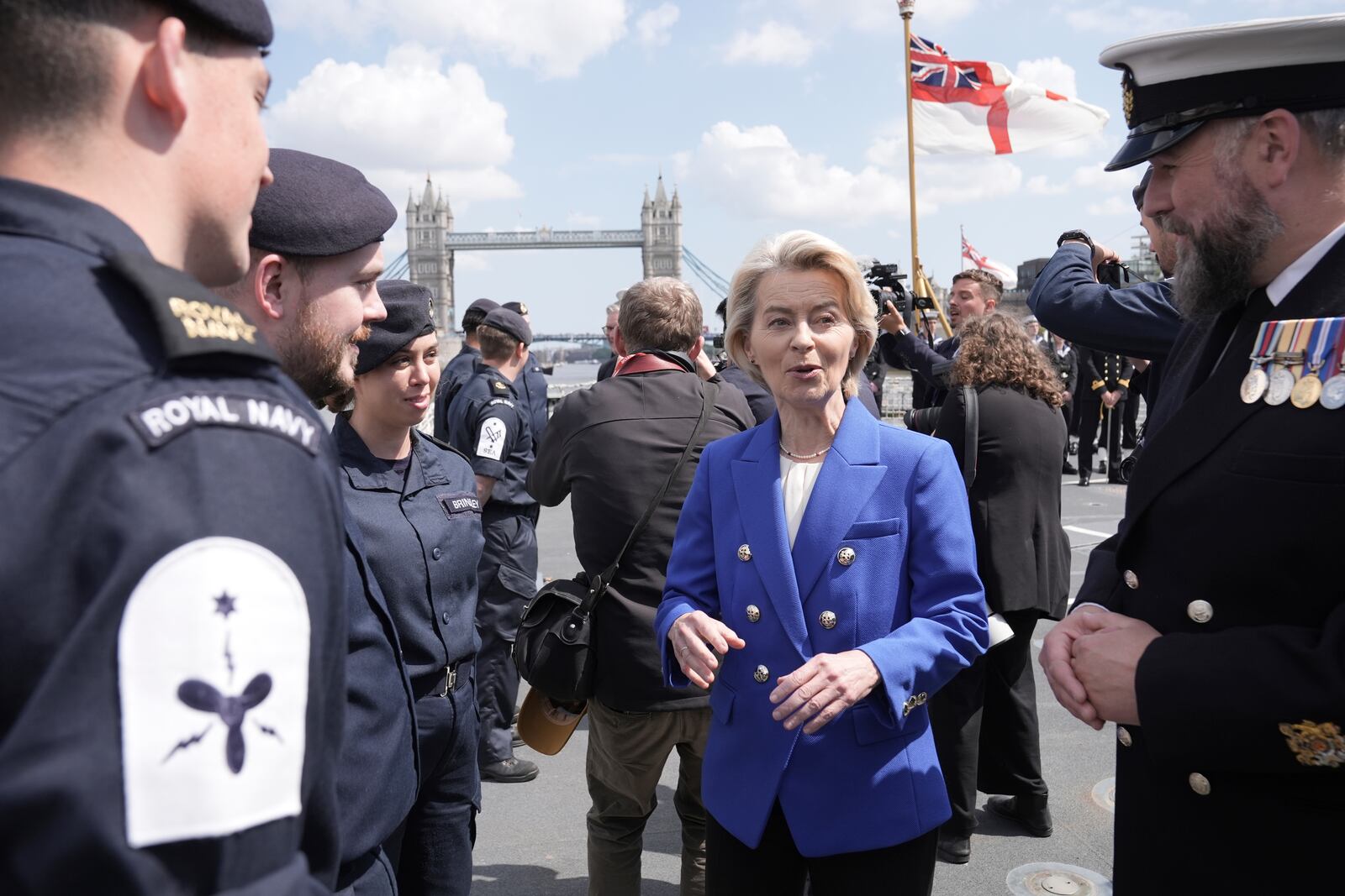President of the European Commission Ursula von der Leyen speaks with members of the Royal Navy on board Type 23 frigate HMS Sutherland in central London, following the UK-EU Summit, Monday, May 19, 2025. (Stefan Rousseau/Pool Photo via AP)