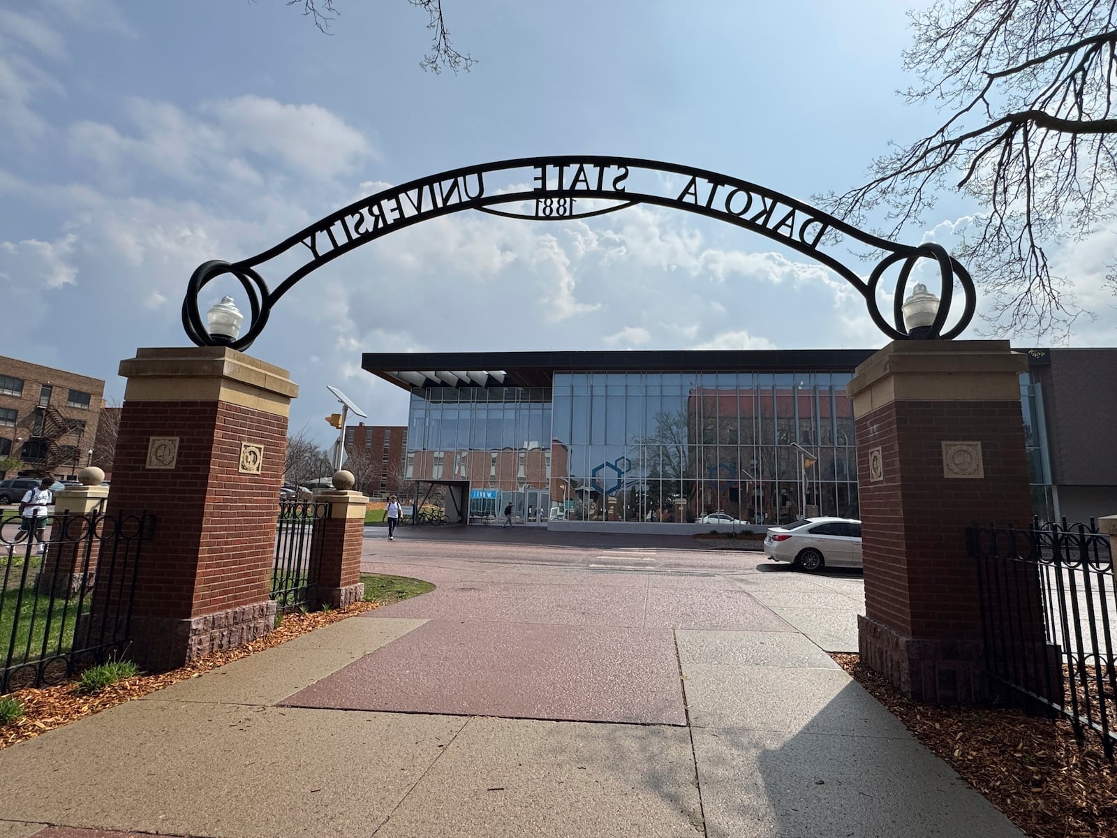 An entrance into Dakota State University's campus, Monday, April 28, 2025, in Madison, S.D. (AP Photo/Sarah Raza)