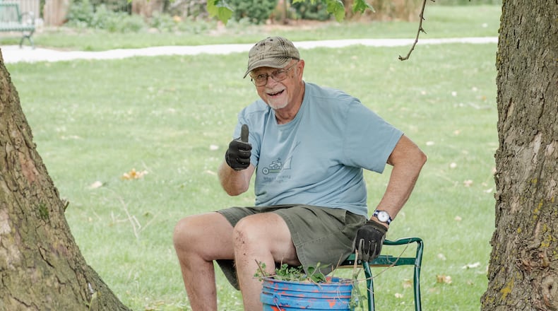 Master Gardener Volunteer Fred Miller works in Snyder Park Gardens & Arboretum in the Hydrangea Garden