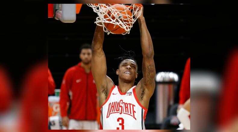 Ohio State guard Eugene Brown dunks against Morehead State during the second half of an NCAA college basketball game in Columbus, Ohio, Wednesday, Dec. 2, 2020. Ohio State won 77-44.