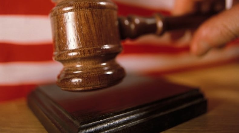 A Montgomery County judge has thrown out evidence against a man arrested on gun charges in an order saying the Dayton police officers “staged” their justification for pulling him over.