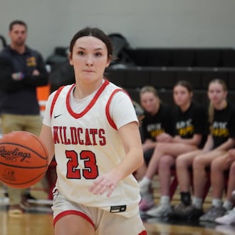 Franklin junior Ellie Whaley dribbles the ball up court against Ross on Saturday. CHRIS VOGT / CONTRIBUTED