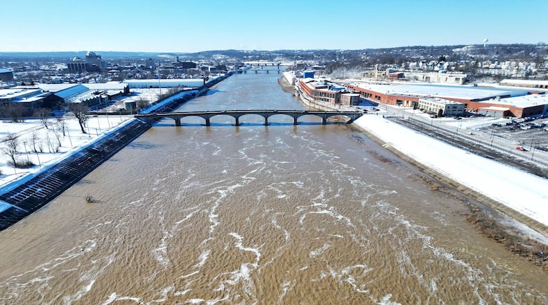 Water level has risen in the Great Miami River in Hamilton Monday, Feb. 17, 2025 after a weekend of heavy rain and snow. NICK GRAHAM/STAFF