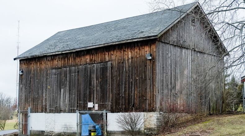 The old barn, which was home to many stray cats over the years, and the unused Park Ranger station are set to be demolished, which will be the first steps in the renovation of Harbin Park. GREG LYNCH/STAFF