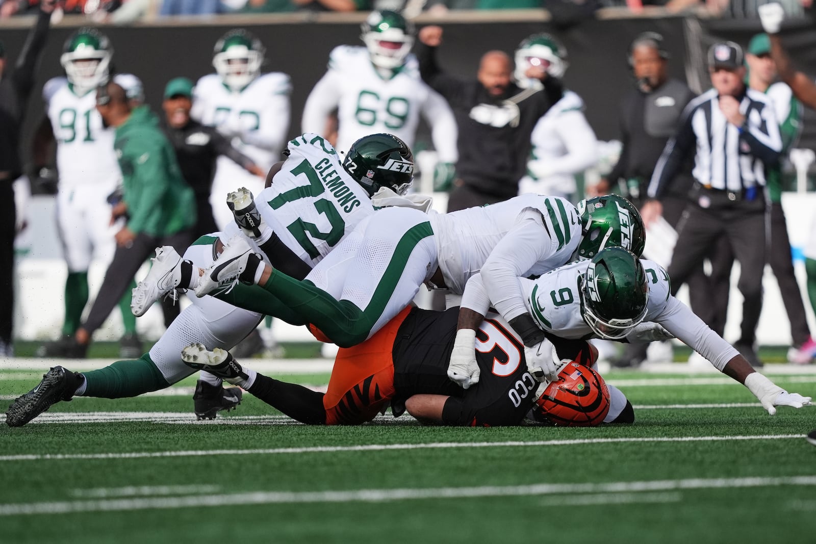 Cincinnati Bengals quarterback Joe Flacco (16) is sacked by New York Jets defensive end Will McDonald IV (9) during the second half of an NFL football game, Sunday, Oct. 26, 2025, in Cincinnati. (AP Photo/Joshua A. Bickel)