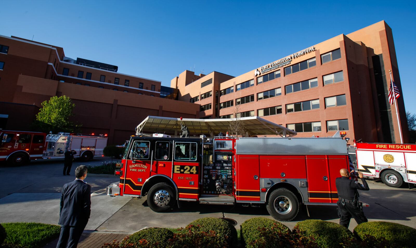 Police and Fire department vehicles from around Butler County lined up with emergency lights on to honor nurses, doctors and workers at Kettering Health Network's Fort Hamilton Hospital Tuesday evening, April 21, 2020 in Hamilton. The same thing happened at many hospitals in the area. NICK GRAHAM / STAFF