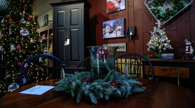 Downtown Waynesville's annual Hearth Warming Holiday shopping event kicked off over the weekend of November 6th through 8th 2020. The "Antiques Capital of the Midwest" is now officially decked out for the holiday season. Shoppers were able to check out the latest holiday offerings, get gift & decorating ideas as well as recipes from participating shops. Hearth Warming Holiday continues next weekend, November 13th through 15th 2020. TOM GILLIAM/CONTRIBUTING PHOTOGRAPHER