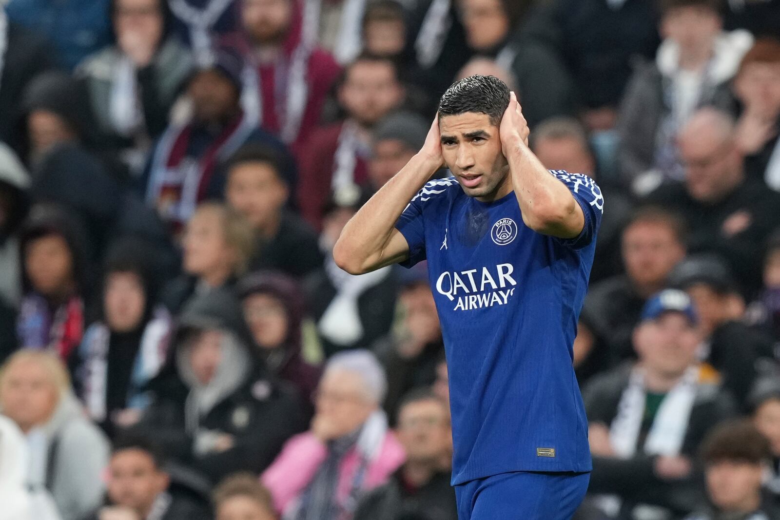 PSG's Achraf Hakimi celebrates after scoring his side's first goal during the Champions League quarterfinal second leg soccer match between Aston Villa and Paris Saint-Germain at the Villa Park stadium, in Birmingham, England, Tuesday, April 15, 2025. (AP Photo/Frank Augstein)