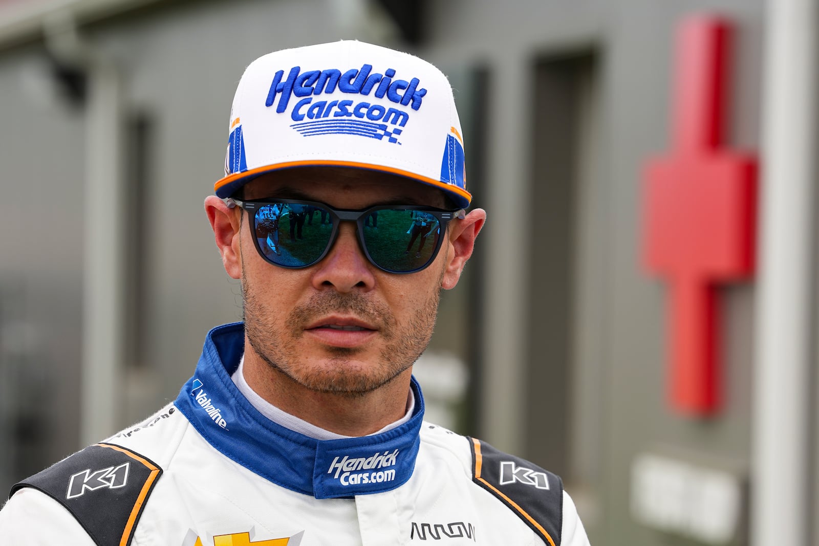Kyle Larson is interviewed after he was checked at the infield hospital after a crash during practice for the Indianapolis 500 auto race at Indianapolis Motor Speedway in Indianapolis, Friday, May 16, 2025. (AP Photo/Michael Conroy)