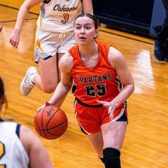 Waynesville High School senior Maggie Stephenson dribbles the ball up court during their game on Jan. 22, 2026 at Oakwood. ELIJAH COOK / CONTRIBUTED