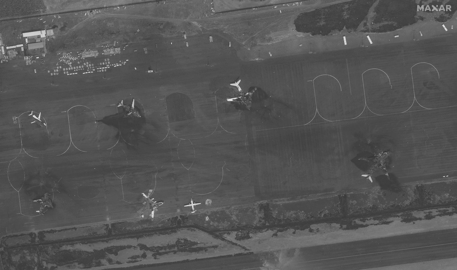 This satellite image provided by Maxar Technologies shows destroyed airplanes on the tarmac at the Sanaa International Airport in Yemen on Wednesday, May 7, 2025, after a Tuesday Israeli attack. (Maxar Technologies via AP)