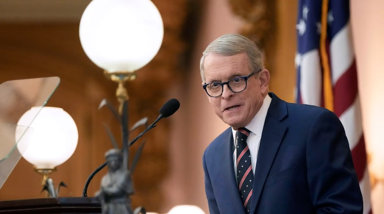 Ohio Gov. Mike DeWine presents his budget at the State of the State event at the Statehouse in Columbus, Ohio, on Tuesday, Jan. 31, 2023. (Barbara J. Perenic/The Columbus Dispatch via AP)