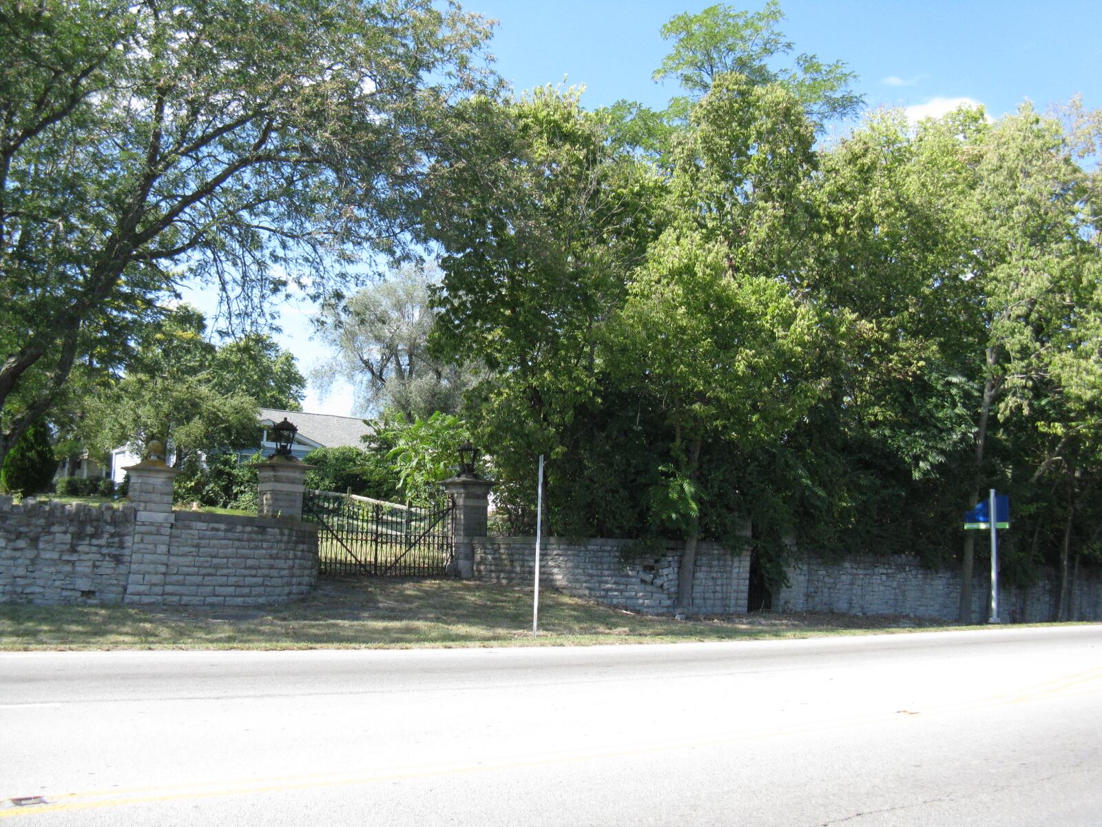 The stone wall and south entrance to Hoovenden estate. Housing developments along Ambassador Drive, Hunter Road and Congress Hill Lane were built on the Hooven property. RICH PILAND/CONTRIBUTED