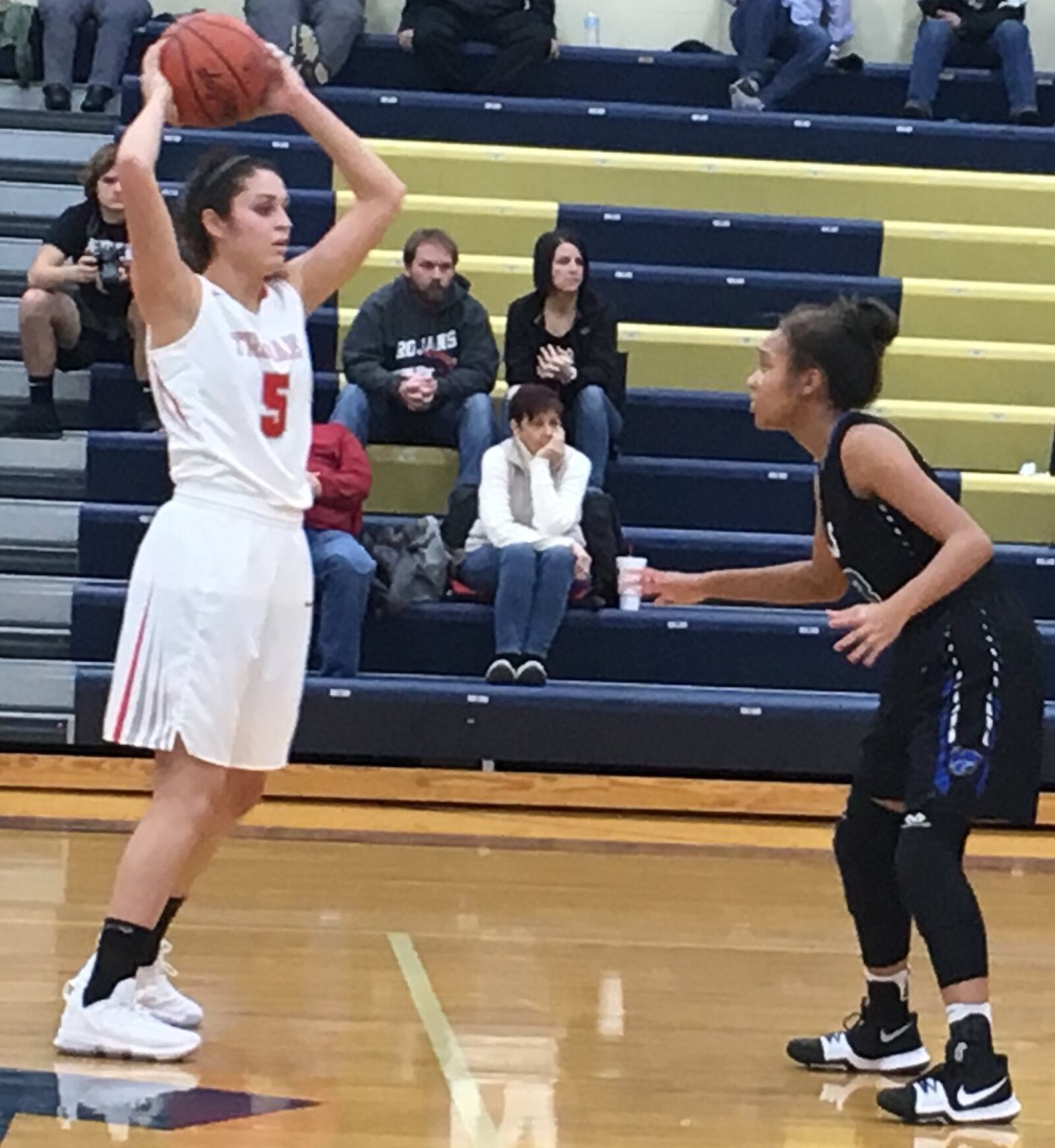 Cincinnati Christian’s Tori Byndon (23) applies defensive pressure to South Charleston Southeastern’s Leslie Flores (5) during Thursday night’s Division IV sectional game at Monroe. RICK CASSANO/STAFF