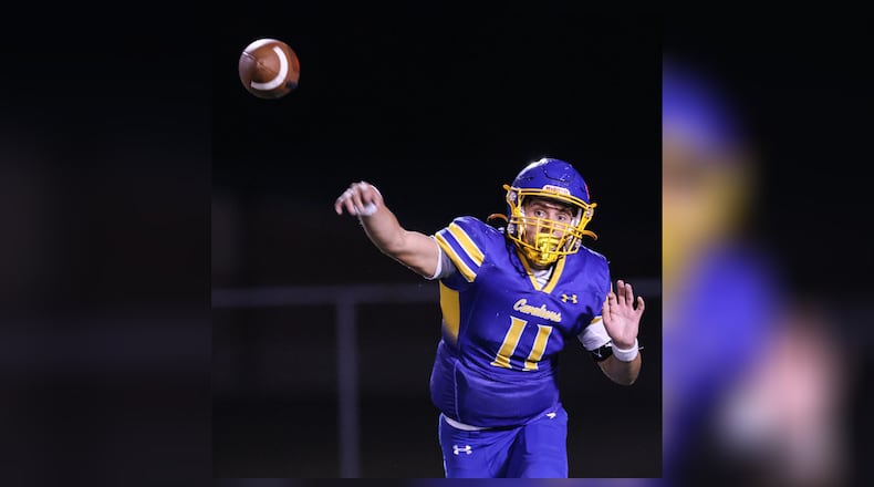 Lehman Catholic senior quarterback Turner Lachey throws during a Three Rivers Conference game against Northridge on Thursday, Sept. 11 at Sidney Memorial Stadium. BRYANT BILLING / STAFF