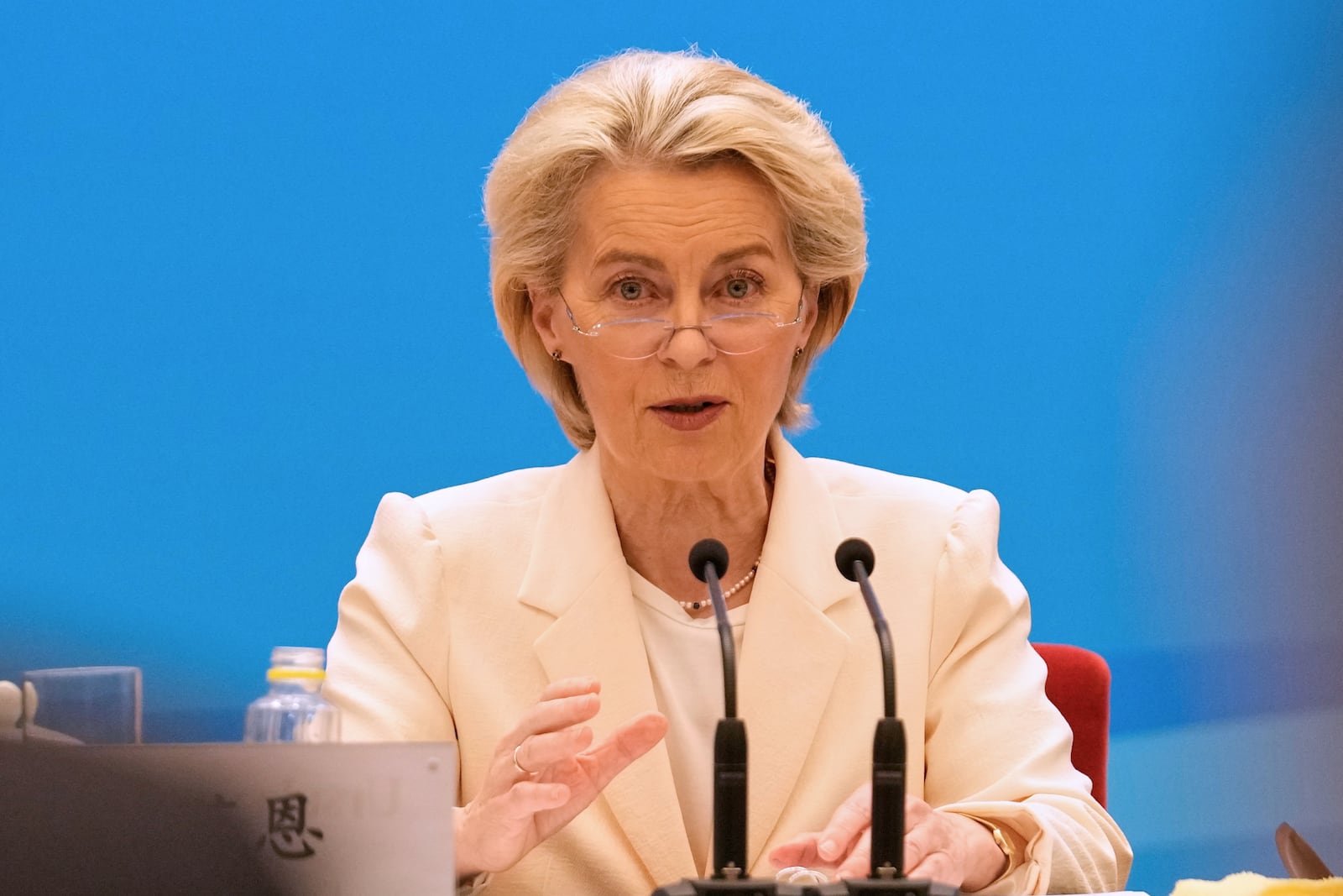 European Commission President Ursula von der Leyen speaks during the EU-China Business leaders symposium at the Great Hall of the People in Beijing, China, Thursday, July 24, 2025. (AP Photo/Mahesh Kumar A., Pool)