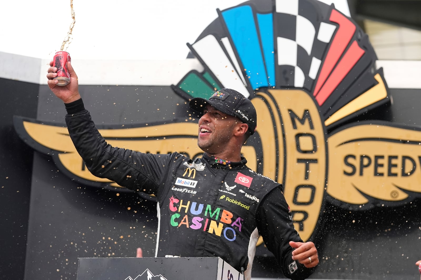 Bubba Wallace celebrates after winning a NASCAR Cup Series auto race at Indianapolis Motor Speedway, Sunday, July 27, 2025, in Indianapolis. (AP Photo/Darron Cummings)