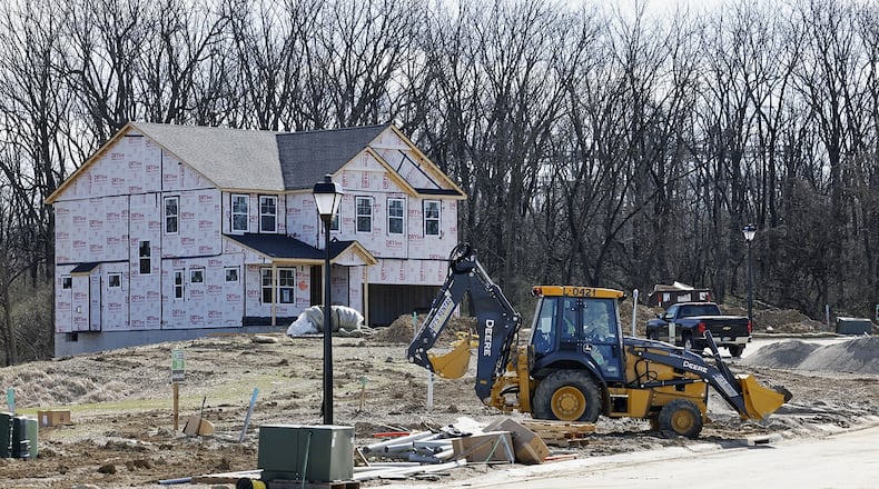 New homes are being built on Hanford Lane in Monroe. While homes continue to be built throughout Butler County, there has been  a “natural decrease” in the population of the county and the State of Ohio overall, stemming in part from the deadly COVID-19 pandemic. NICK GRAHAM/STAFF