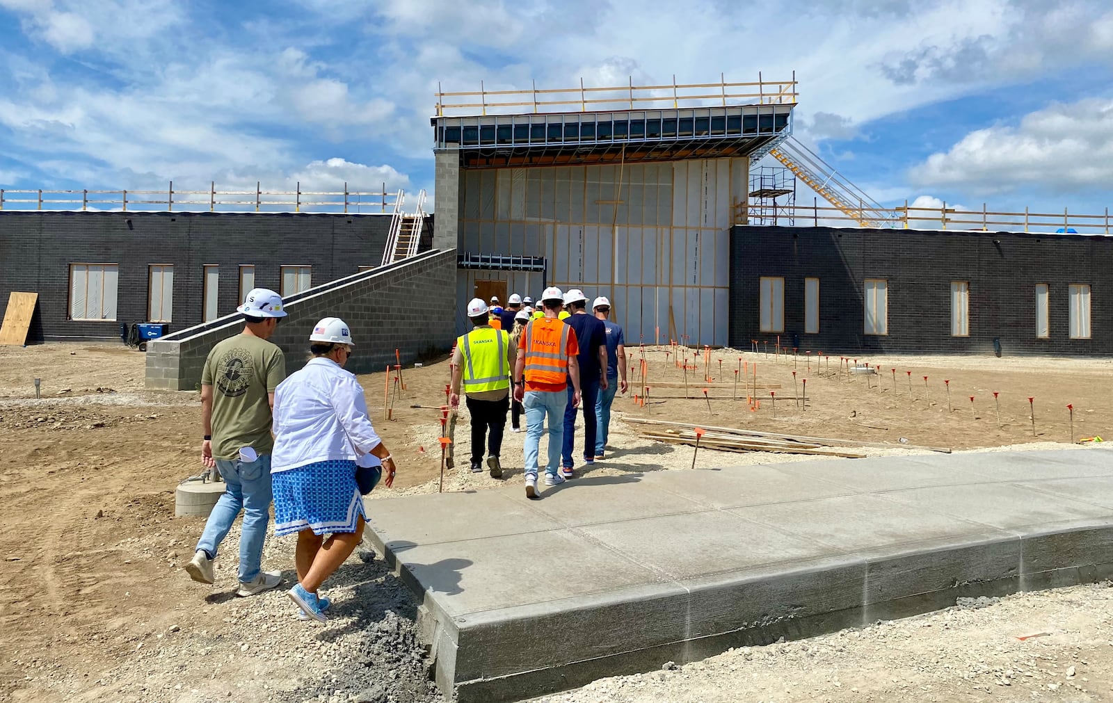 Butler Tech’s $15 million Aviation Hangar is rising from construction dust next to the city’s air strip and teachers and administrators in the fast-growing program recently got their first tour of the state-of-the-art school’s construction site. (Photo By Michael D. Clark/Journal-News)