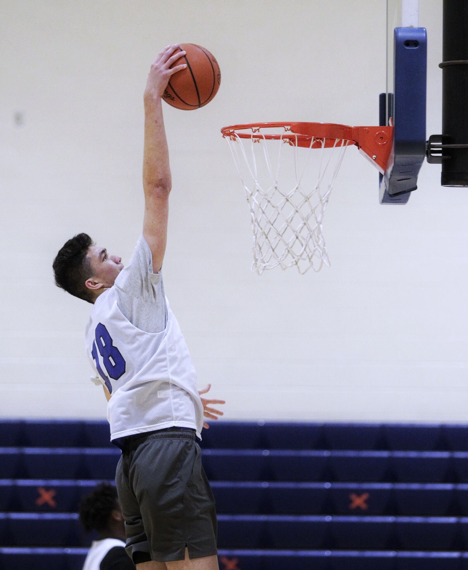 Sage Tolentino, a 210-pound, 7-foot junior from Hawaii is playing basketball for Hamilton High School this season. Tolentino ended up in Hamilton after sports in Hawaii were cancelled due to the coronavirus. He has verbally committed to play college basketball for Bruce Pearl at Auburn University. NICK GRAHAM / STAFF