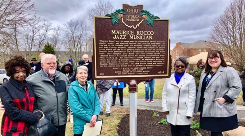 An historic marker was dedicated Saturday at Woodside Cemetery in Oxford, commemorating the life of Maurice Rocco and the history of the cemetery. Participants in the Ohio History Connection marker program, photographed here, include (left to right) Patty Rockhold Caver, a distant cousin and only relative of Rocco; Dick Sollmann, chair, advisory board of W. E. Smith Family Charitable Trust and Smith Library of Regional History; Valerie Elliott, retired from Smith Library; Francis Jackson, president of NAACP, and Allison Susor with Ohio History Connection. Mayor Bill Snavely announced Saturday as Maurice Rocco Day in Oxford.