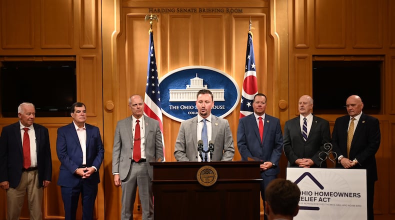 Ohio Rep. Thomas Hall announced the new Ohio Homeowners Relief Act at the statehouse on Wednesday. Pictured here are Rep. Bill Dean, Sen. George Lang, Rep. Adam Bird, Hall, Rep. Rodney Creech, Rep. Bill Roemer (chair of House Ways and Means Committee), and Rep. Tom Young