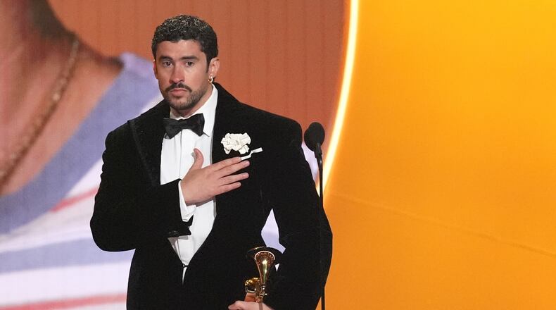 Bad Bunny accepts the award for album of the year for "Debí Tirar Más Fotos" during the 68th annual Grammy Awards on Sunday, Feb. 1, 2026, in Los Angeles. (AP Photo/Chris Pizzello)
