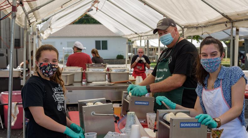 The 43rd Annual Italian Fall Festa was modified to become a drive-thru only event featuring the signature foods of the festival due to COVID-19 restrictions for large gatherings. Held from Friday, September 11th through Sunday, September 13th, 2020 at Bella Villa Hall in Kettering, home of the John Pirelli Lodge #1633 OSIA (Order Sons of Italy in America), the drive thru version of the festa was an overwhelming success. Here's a behind the scenes look at the festa's food preparation and drive-thru operation. TOM GILLIAM/CONTRIBUTING PHOTOGRAPHER