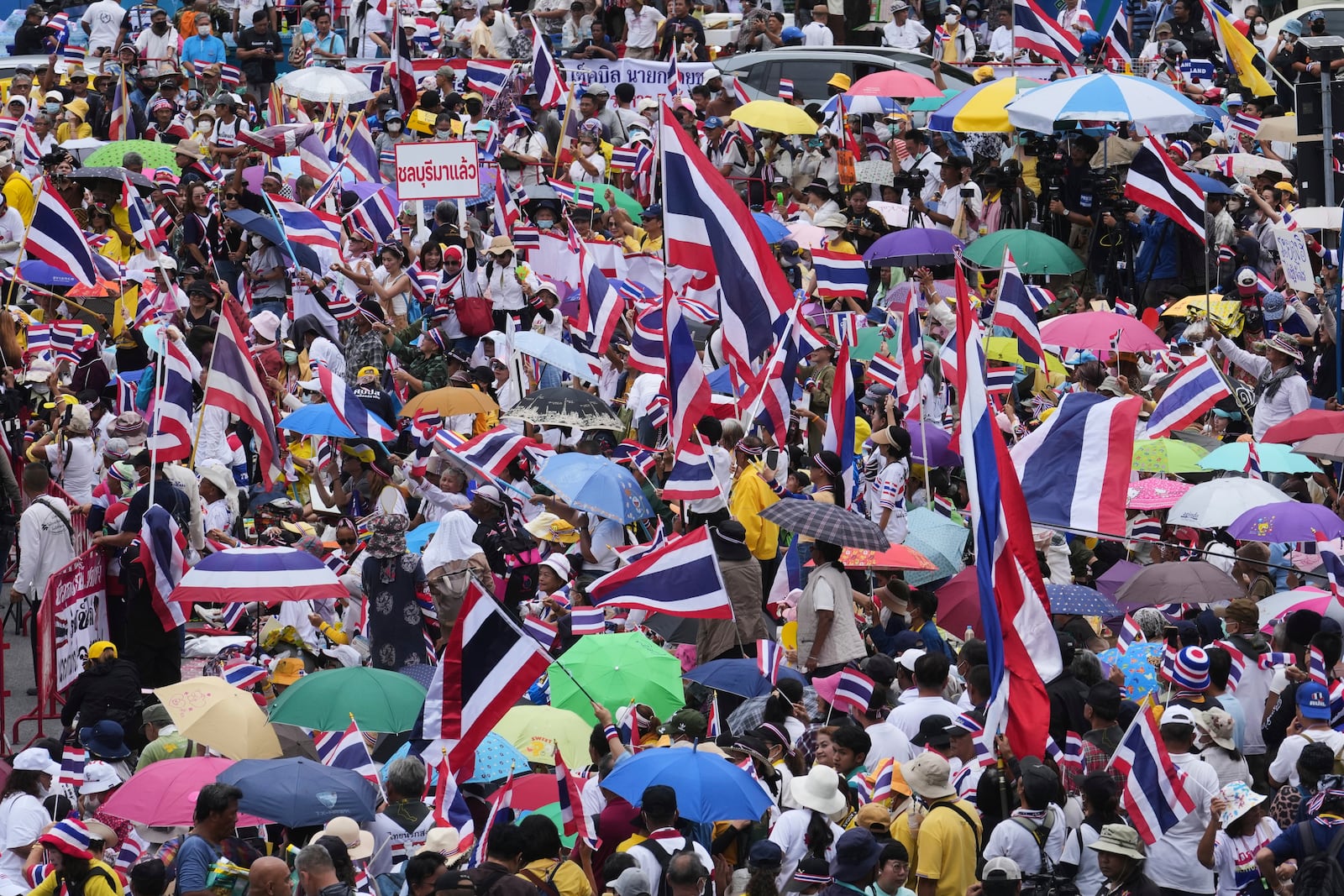 Protesters gather at Victory Monument demanding Thailand's Prime Minister Paetongtarn Shinawatra resign in Bangkok, Thailand, Saturday, June 28, 2025. (AP Photo/Sakchai Lalit)