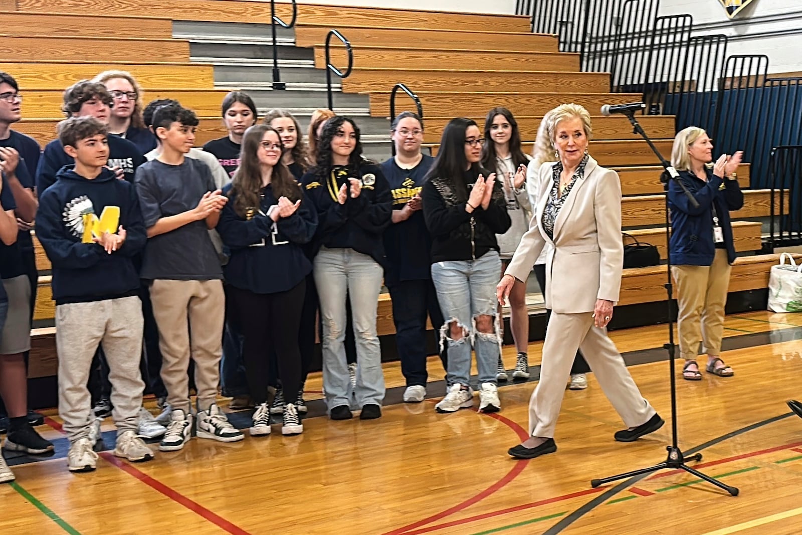 U.S. Secretary of Education Linda McMahon, front right, visits Massapequa High School, Friday, May 30, 2025, in Massapequa, N.Y., along with local elected officials. (AP Photo/Philip Marcelo)