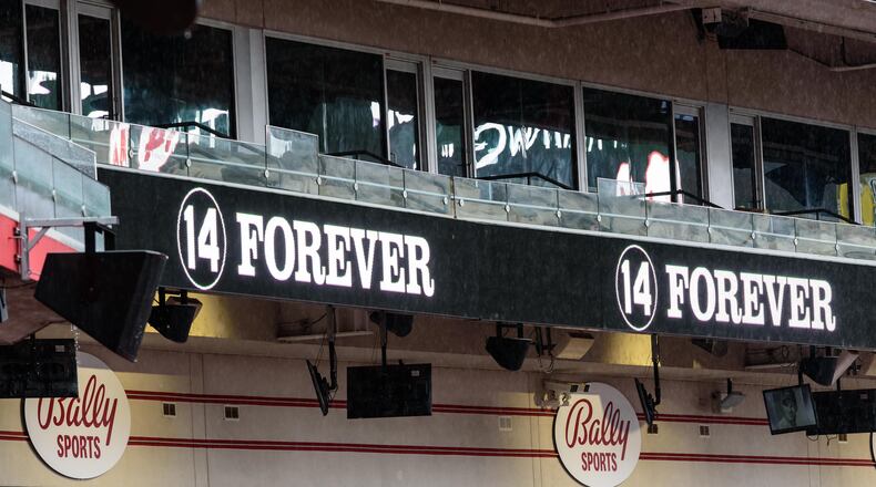 Thousands of Reds fans braved the steady rains to pay their respects to Cincinnati Reds legend and Major League Baseball’s all-time hits leader Pete Rose for a memorial visitation on Sunday, Nov. 10, 2024, at Great American Ball Park. Hosted by the Cincinnati Reds and Rose’s family, the visitation lasted 14 hours, a tribute to the “Hit King’s” jersey number. Rose died on Sept. 30 at the age of 83. TOM GILLIAM / CONTRIBUTING PHOTOGRAPHER