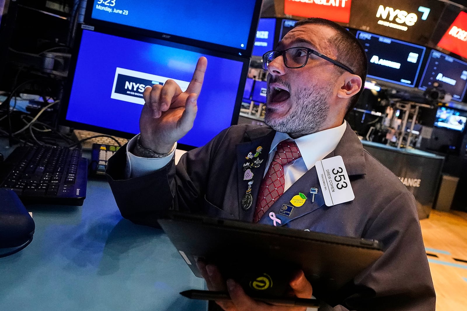 Trader Drew Cohen works on the floor of the New York Stock Exchange, Monday, June 23, 2025. (AP Photo/Richard Drew)