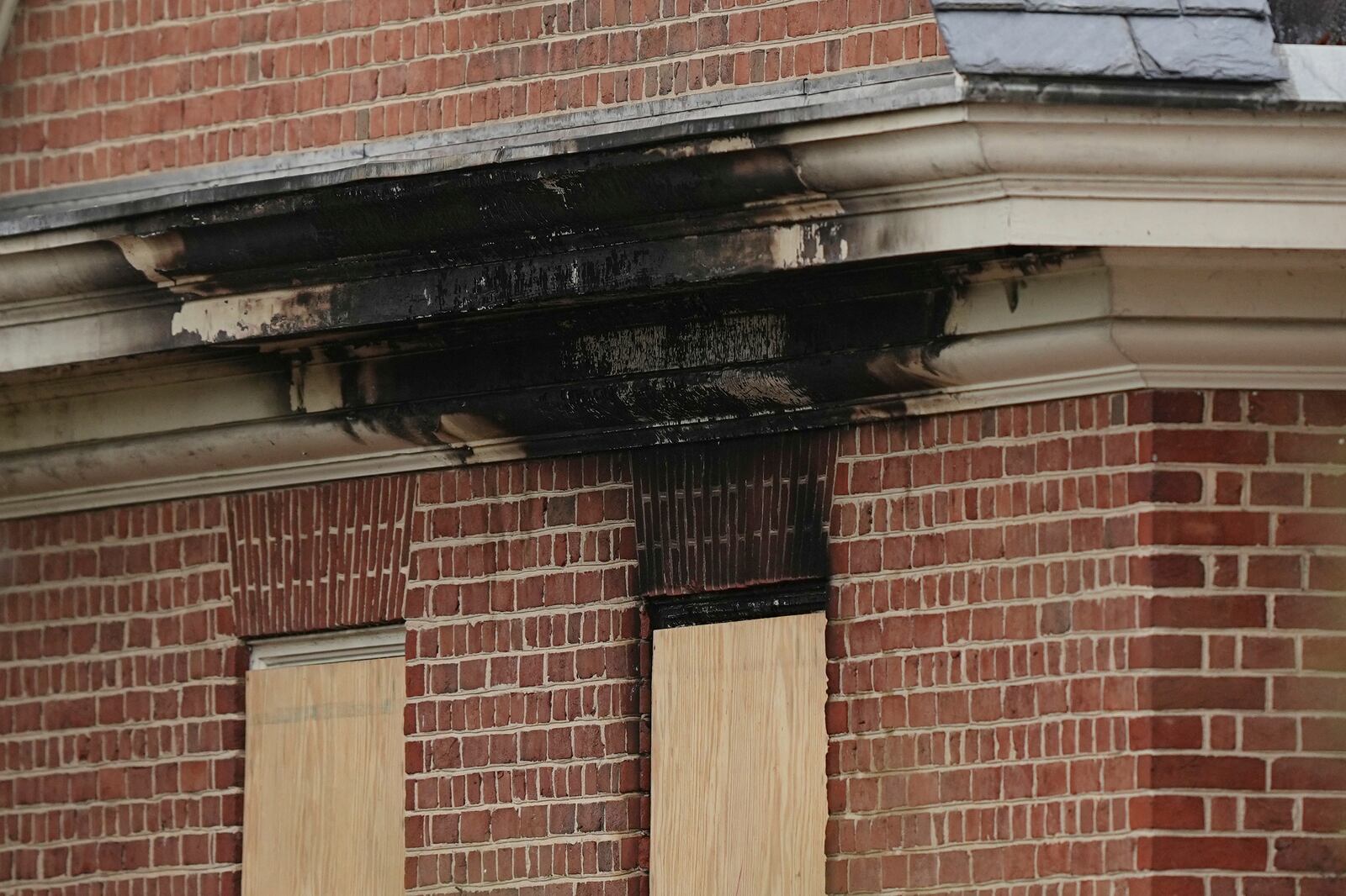 The aftermath of a fire can be seen at Pennsylvania governor's official residence in Harrisburg, Pa., Monday, April 14, 2025. (AP Photo/Matt Rourke)