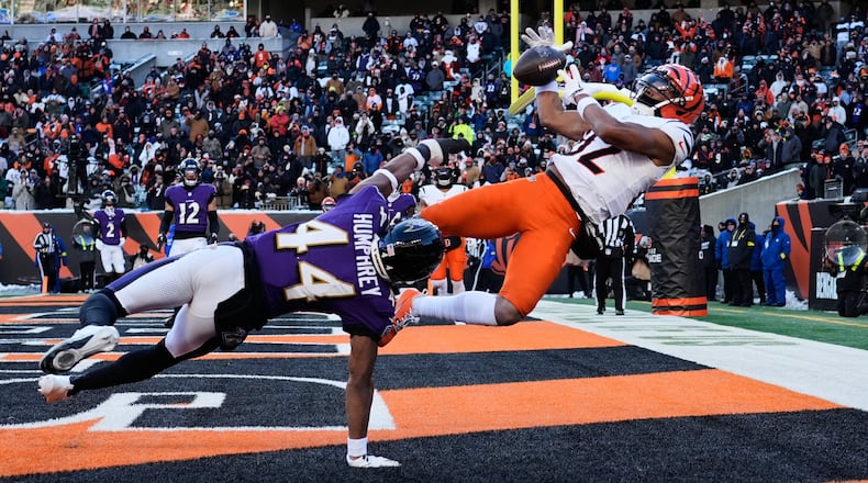 Baltimore Ravens cornerback Marlon Humphrey (44) breaks up a pass intended for Cincinnati Bengals wide receiver Mitchell Tinsley (82) during the second half of an NFL football game, Sunday, Dec. 14, 2025, in Cincinnati. (AP Photo/Carolyn Kaster)