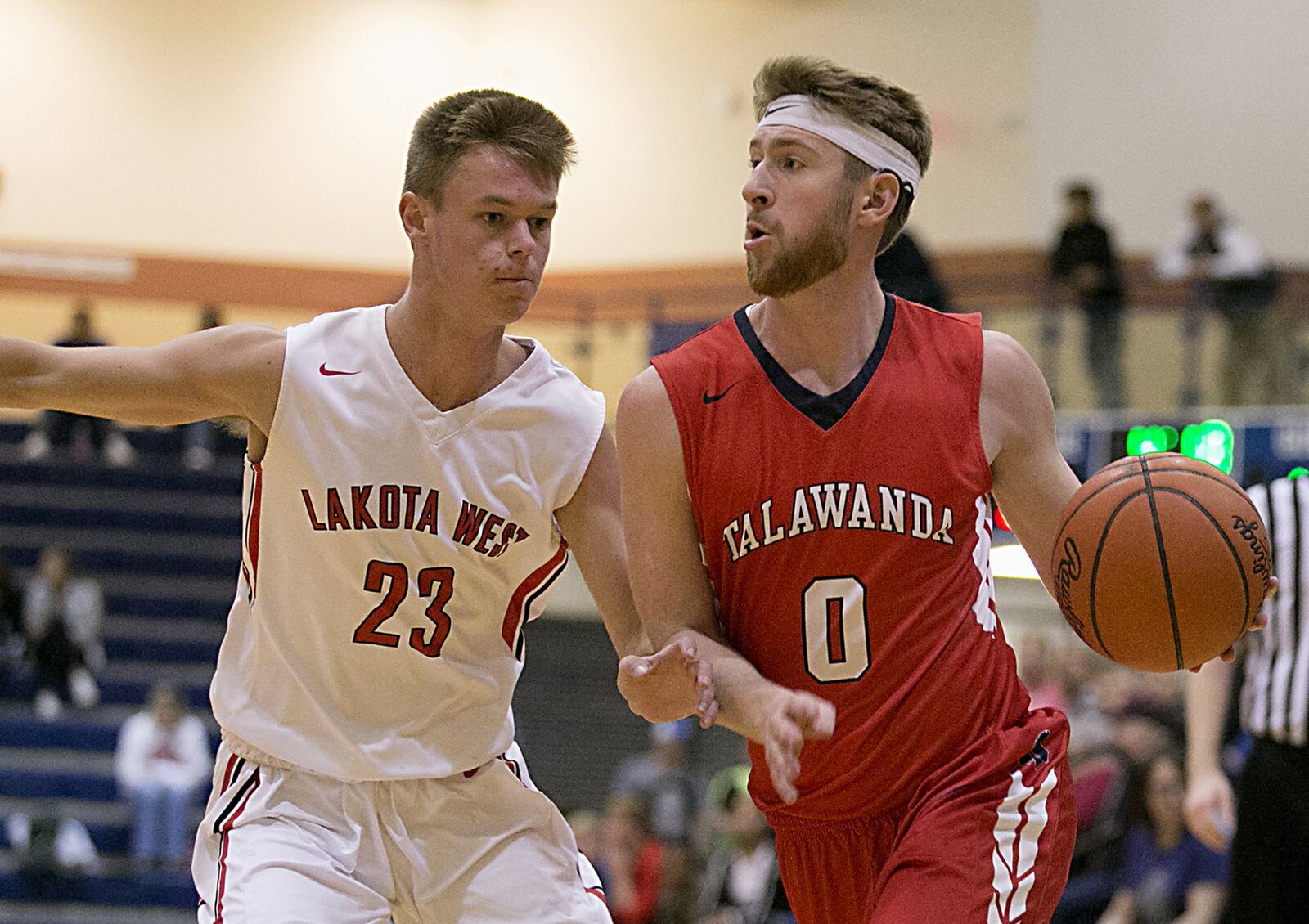 Talawanda guard Evan James is covered by Lakota West forward Matt Oehler during the All-Butler County All-Star boys basketball game at the Hamilton Athletic Center in Hamilton on April 7, 2018. CONTRIBUTED PHOTO BY E.L. HUBBARD