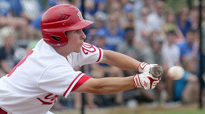 Lakota West’s A.J. Petersen attempts to bunt during a Division I district final against Springboro at Centerville last Saturday. CONTRIBUTED PHOTO BY E.L. HUBBARD