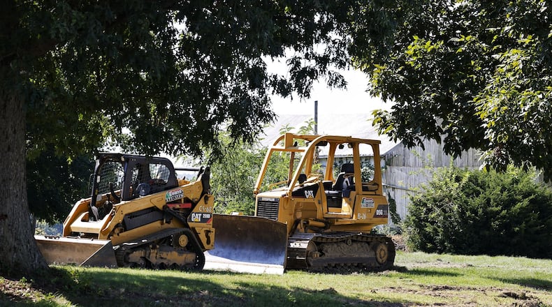 Cincinnati Financial Corp. had purchased the former Benzing Estate, which included the home, barn and silo. Cincinnati Financial purchased the home, intending to use the property for company purposes, but officials said it was beyond repair and razed the structures. NICK GRAHAM/STAFF