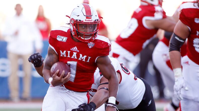 OXFORD, OHIO - OCTOBER 19: Jaylon Bester #1 of the Miami of Ohio Redhawks runs the ball during the fourth quarter in the game against the Northern Illinois Huskies at Yager Stadium on October 19, 2019 in Oxford, Ohio. (Photo by Justin Casterline/Getty Images)