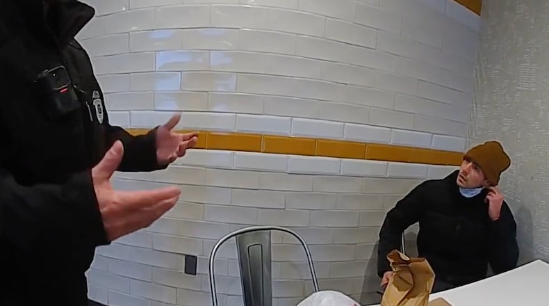 This image taken from video released by Pennsylvania State Police shows Luigi Mangione, a suspect in the fatal shooting of UnitedHealthcare CEO Brian Thompson, at a McDonald's in Altoona, Pa., on Dec. 9, 2024. (Pennsylvania State Police via AP)