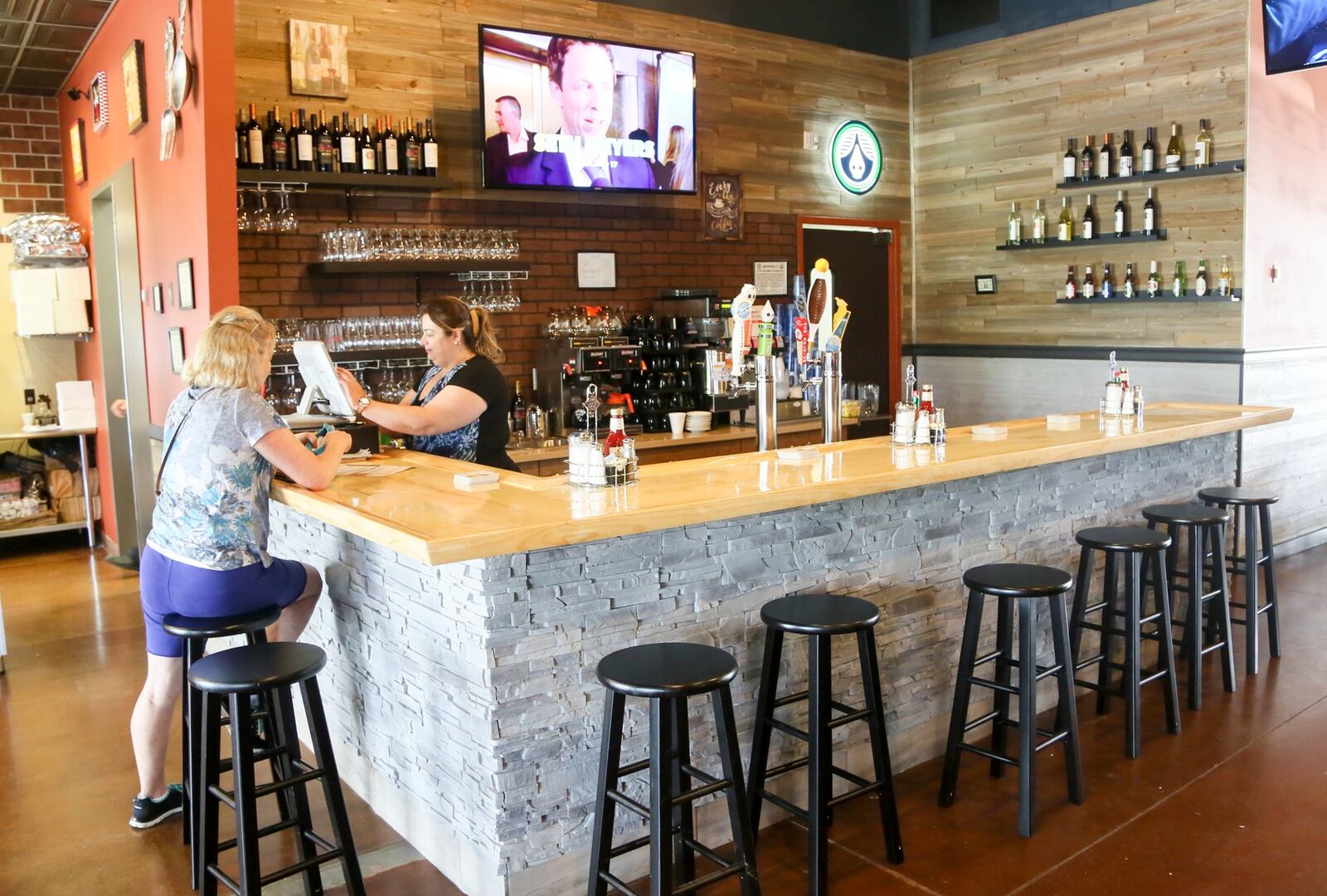 A newly constructed bar at the front of Fireside Cafe features six local and regional beers on tap, plus a selection of wines by the glass or bottle and choices of domestic or imported bottled beers. 