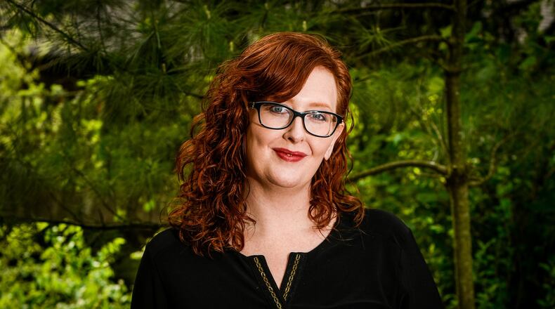 Amy Parker, a former heroin addict, has been clean for five years and hopes to help other addicts beat their addiction by joining one of Butler County’s Heroin Response Teams in Hamilton, Middletown and Oxford. NICK GRAHAM/STAFF