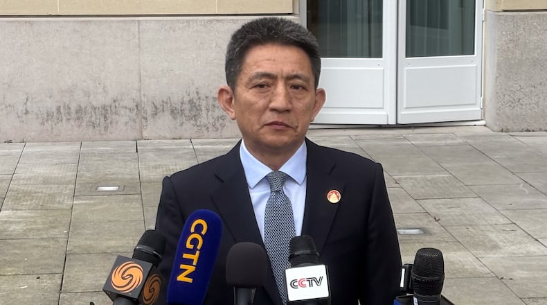 Chinese lead trade negotiator Li Chenggang gives a press conference at the Organization for Economic Cooperation and Development headquarters, Monday, March 16, 2026, in Paris, France. (AP Photo/Oleg Cetinic)