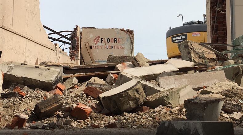 The Treble Building, formerly the Third Street Department Store, at 216 S. Third St., has been demolished. The facade stones of an attached building at 220 S. Third St., known as the former Joffe Furniture building, were to be saved so they someday could be reassembled on the same site or elsewhere. The facade, however, had to come down with the other building’s structure. GREG LYNCH/STAFF