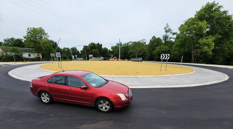 The roundabout is now open at the five points intersection where Tylersville Road, Tulley Road, Hamilton-Mason Road, Hancock Ave. and Grand Blvd. meet at the border of Hamilton and Fairfield Twp. in Butler County. NICK GRAHAM/STAFF