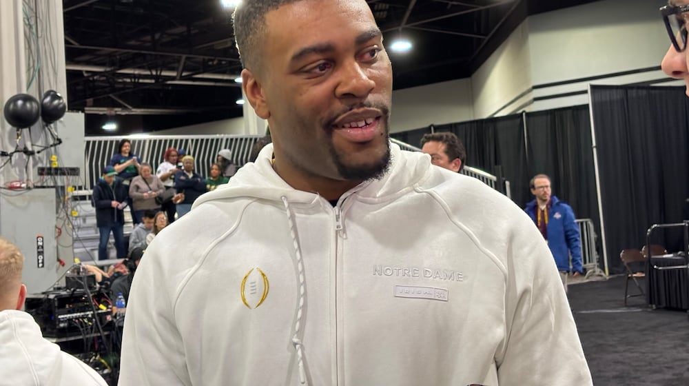 Notre Dame assistant coach Mike Mickens, a Wayne High School grad, speaks at CFB Media Day in Atlanta, Ga., on Jan. 18, 2025.
